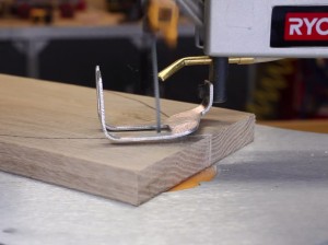 curring out the board scroll saw