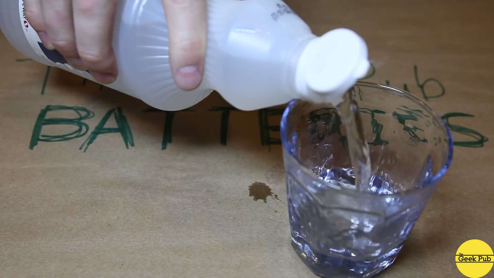 pour vinegar into a glass