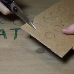 cutting out cardboard circles