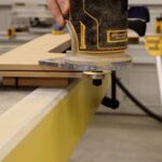 Routing for T-molding wall mount arcade