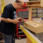 caulking the wall mount arcade