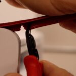 Notching T-molding wall mount arcade