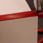 Cutting T-molding wall mount arcade